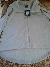 Ladies Nike, New With Tags.Hooded Jacket Size Medium Light gray