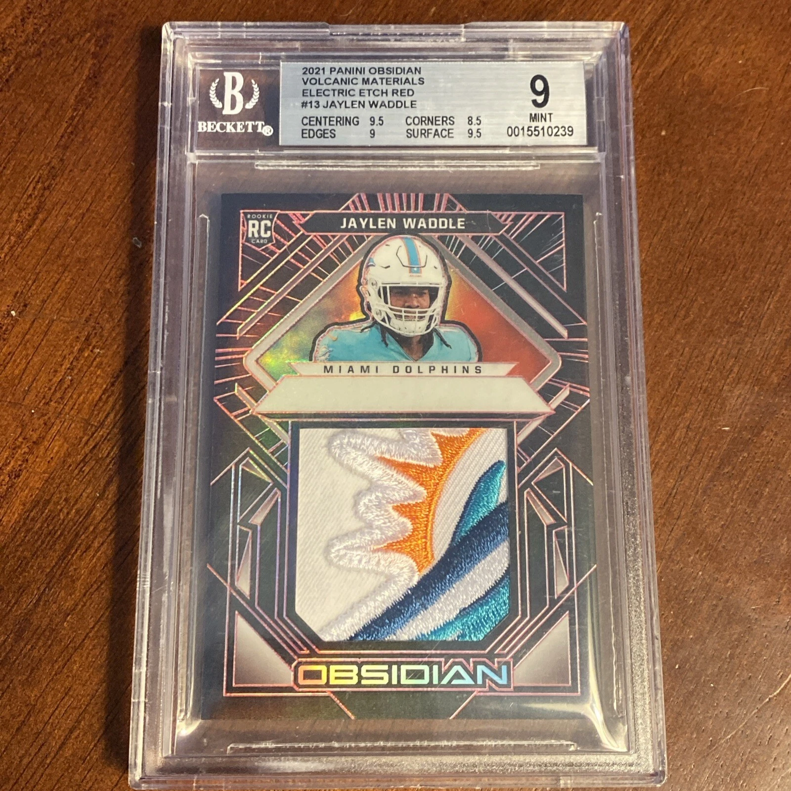 Jaylen Waddle Panini Obsidian Volcanic Materials #VMJW Electric Etch Red