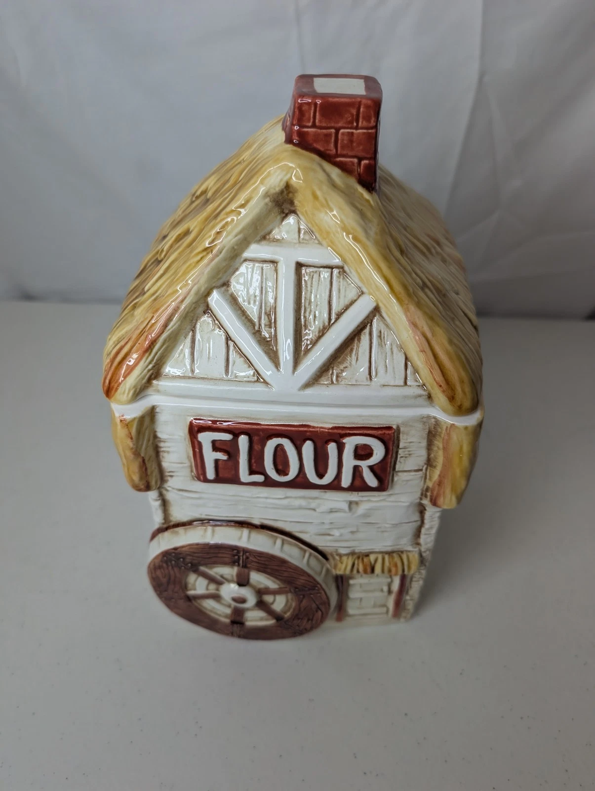 Vintage Sears Roebuck & Co. 1981 Ceramic Thatched Roof Cottage Flour Canister
Opens in a new window