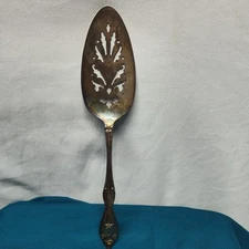 WM. A. Rodgers Oneida Ltd slotted serving cake tomato spoon replacement star art