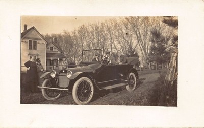UNIDENTIFIED FAMILY ADMIRING THE NEW AUTOMOBILE~REAL PHOTO~RPPC