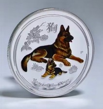 The Year of the Dog coin comes in a protective plastic case silver plated coin