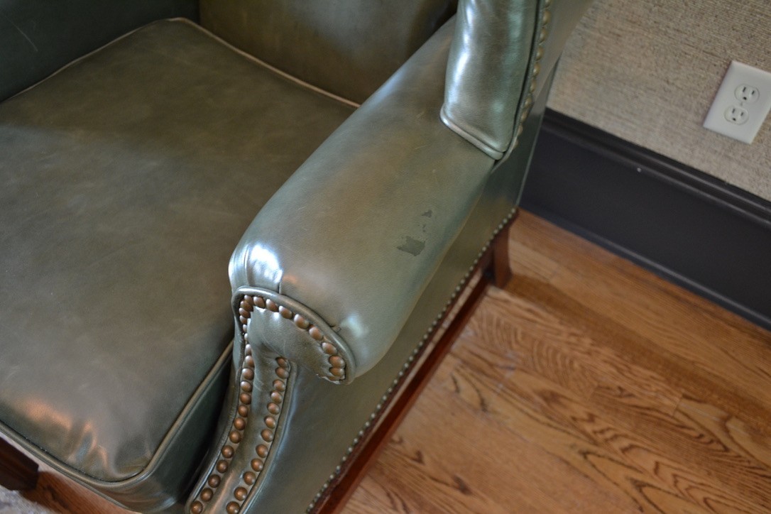 Late 20th Century Leather Chippendale Wing Chair and Ottoman