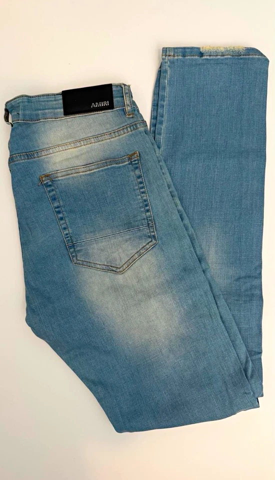 AMIRI Men’s Light Wash Blue Distressed Jeans Logo Patch - Image 1 of 3