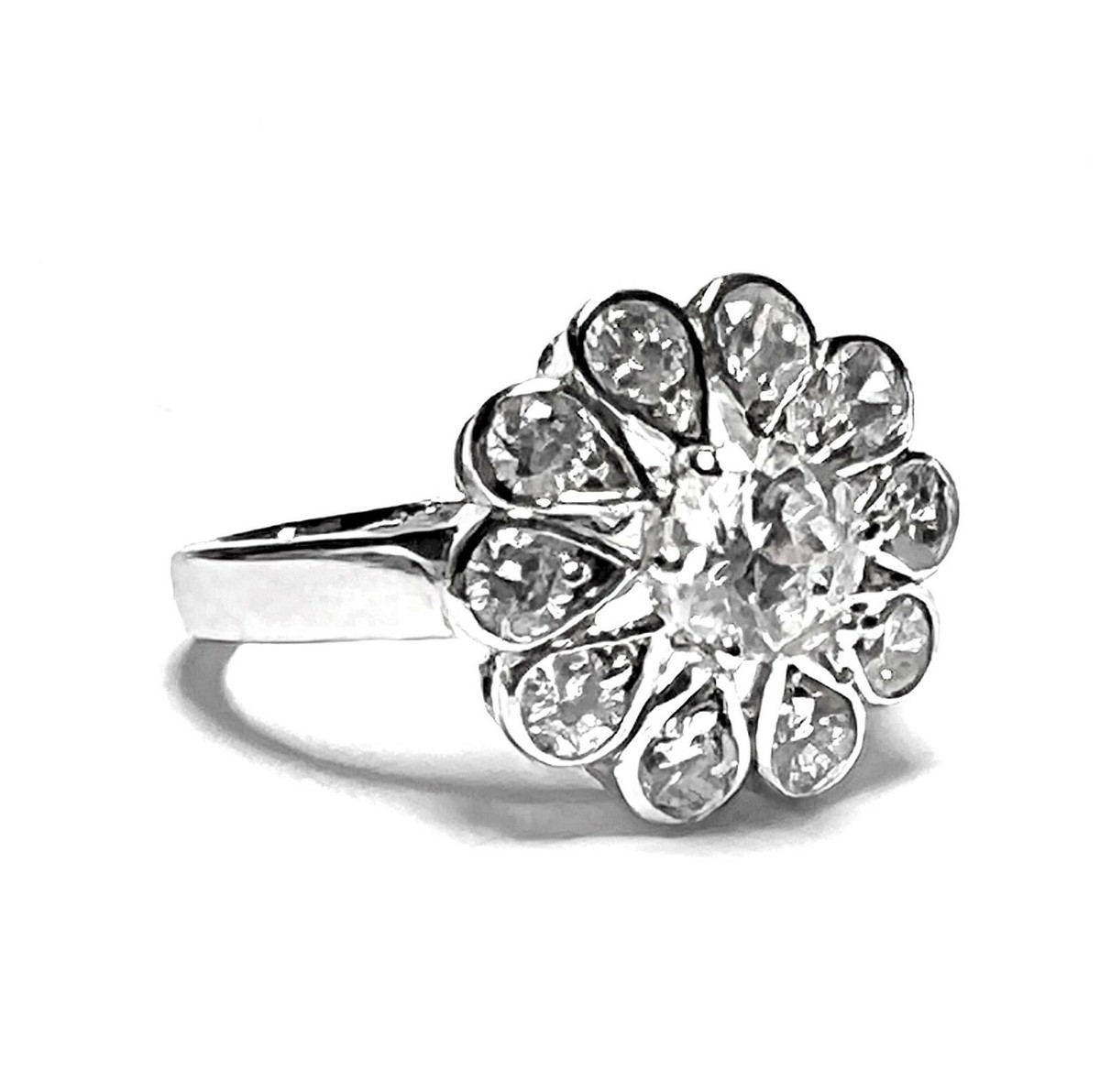 JJR042-Silver ring with semi large CZ surrounded by small white