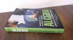 Algeria: Anger of the Dispossessed - Hardcover, by John Phillips; Martin - Good