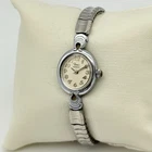 Women's Vintage 2001 TIMEX Silver Tone Classic Petite Oval Watch Steel Flex Band