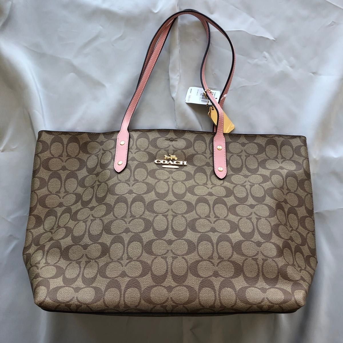 COACH Signature Pink Tote Bag with Iconic C Logo Design