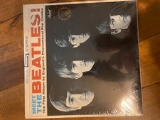 Meet The Beatles St2047 Gold Record Award LP w/original shrink wrap & price tag.