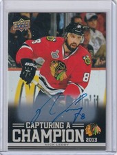 2025-26 CHICAGO BLACKHAWKS CENTENNIAL CAPTURING A CHAMPION AUTO 