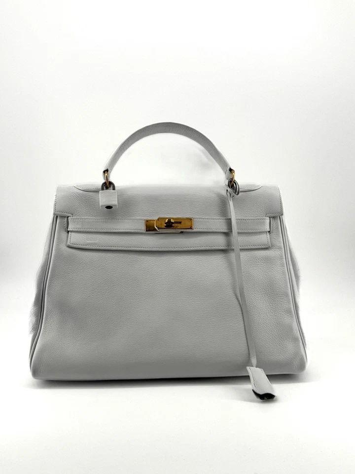 Sac Hermès Kelly en cuir grainé blanc, quincaillerie dorée, boîte + dustbag - Photo 2/4