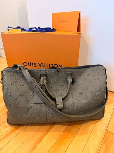 Rare travel duffle bag  100% leather Louis Vuitton Keepall 50 bandouliere M57963