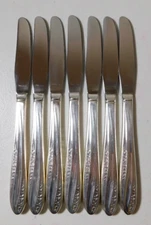 WM. ROGERS MFG MODERN PRECIOUS PATTERN SILVERPLATE SET OF 7 DINNER KNIVES 8 1/2"