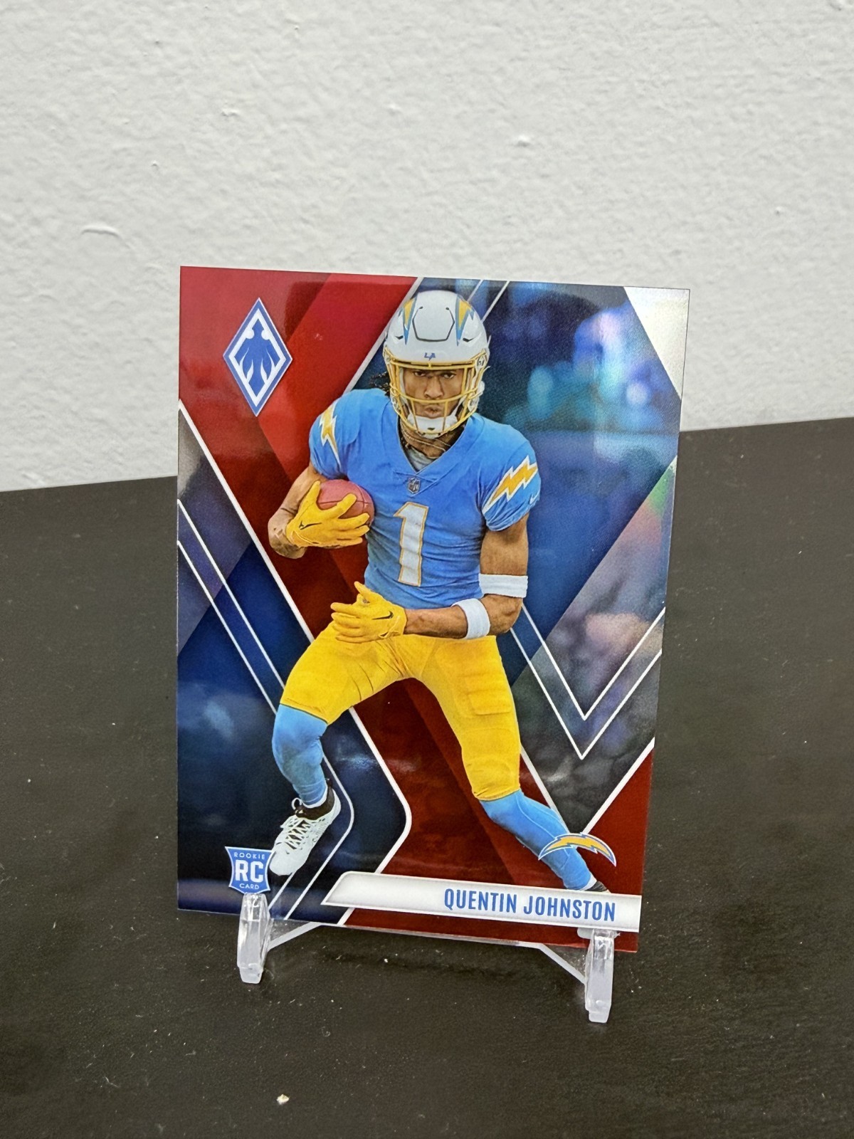2023 Panini Phoenix Quentin Johnston Red /250 RC #107 Chargers