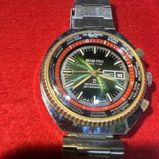 Reloj de colección Grand Prix Swiss Time World Timer para hombre esfera verde Sunburst años 70