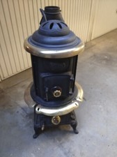 stufa a legna - parlor comfort 10 kw, usata, con rilievi in ottone.