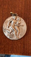 Dije colgante vintage de mujer corredora atleta metal tono plata 1978