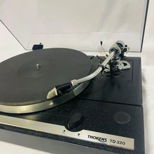 THORENS TD320 Thorens Semi-Automatic Record Player. Lacking professional