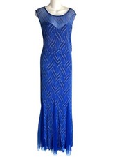 Elegant Blue Sleeveless Evening Gown With Shimmering Detail  Sheer Neckline