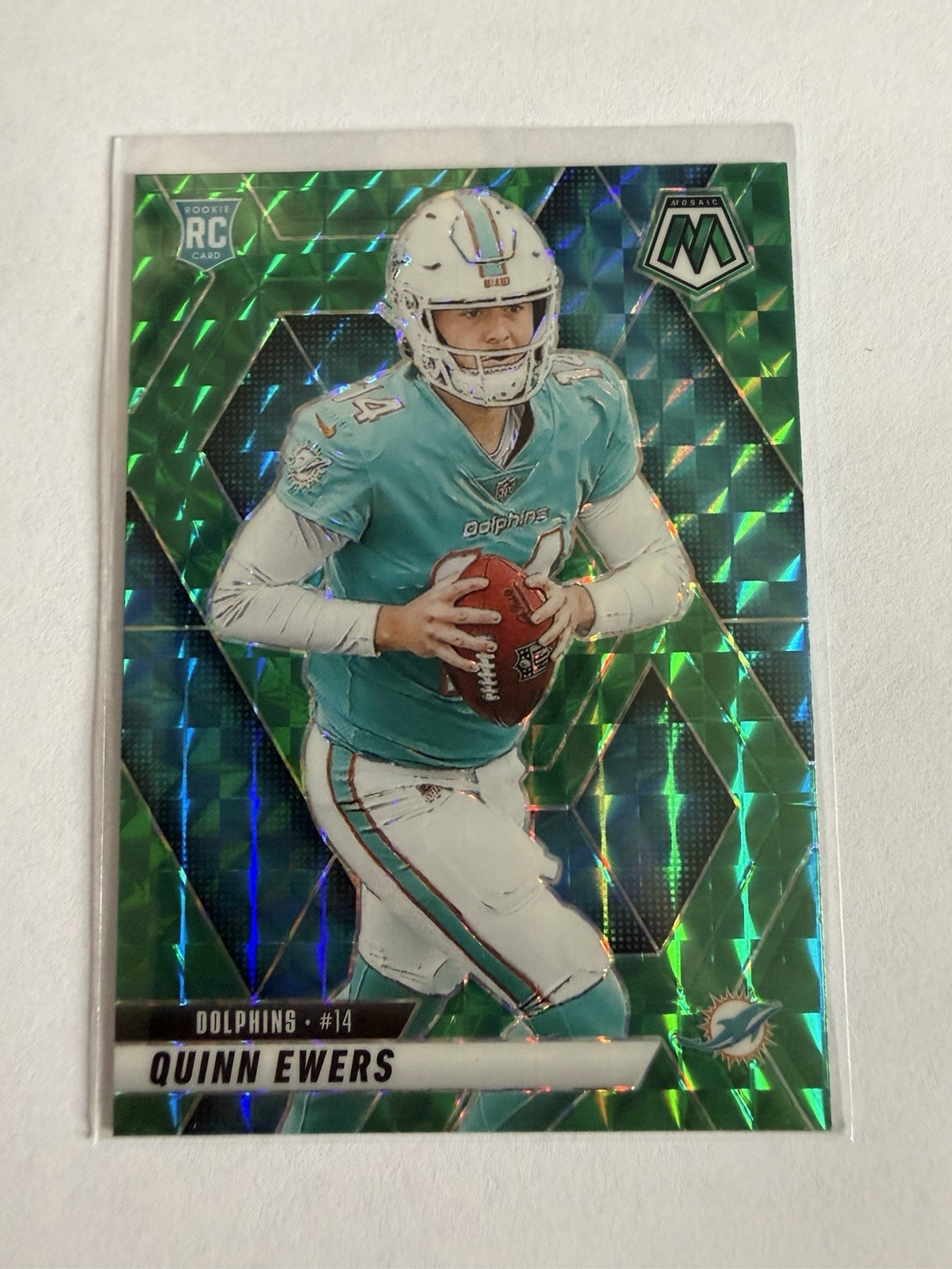 2025 Panini Mosaic, Green Prizm parallel rookie #308 QUINN EWERS, Miami Dolphins