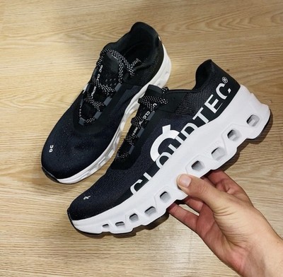 On Running Cloudmonster Herren Laufschuhe Gr. UK 8 schwarz weiße Sohle