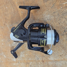 Shakespeare 2002 Black & Gold Fishing reel - Cosmos 2002 - Used Clean + Line