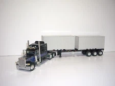 DCP FIRST GEAR 1/64 BLACK PETE 389 W/T 63'' SLEEPER W/T TRI-AXLE CONTAINER TRAIL