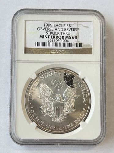 1999 American Silver Eagle Obverse And Reverse Struck Thru NGC Mint Error MS 68