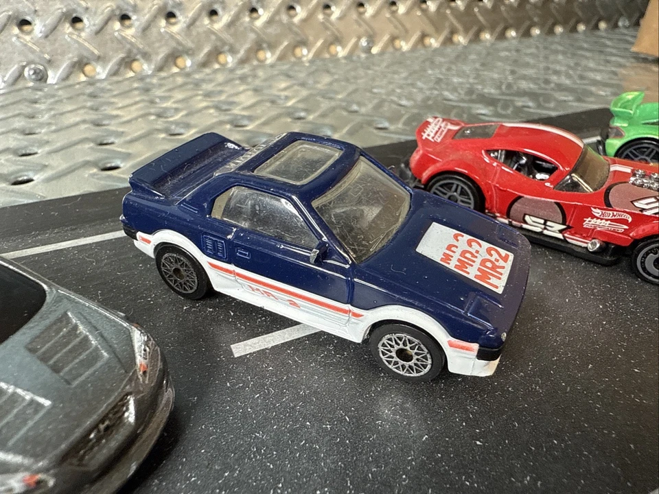 DE COLECCIÓN MATCHBOX 1:56 1986 #23 TOYOTA MR2 LLANTAS DE MALLA AZUL BLANCO MACAO + 5 lote aleatorio Foto 2 de 4