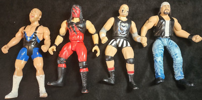 ◙ 4 - WWE JAKKS WRESTLING FIGURES LOT IN USED BUT NICE