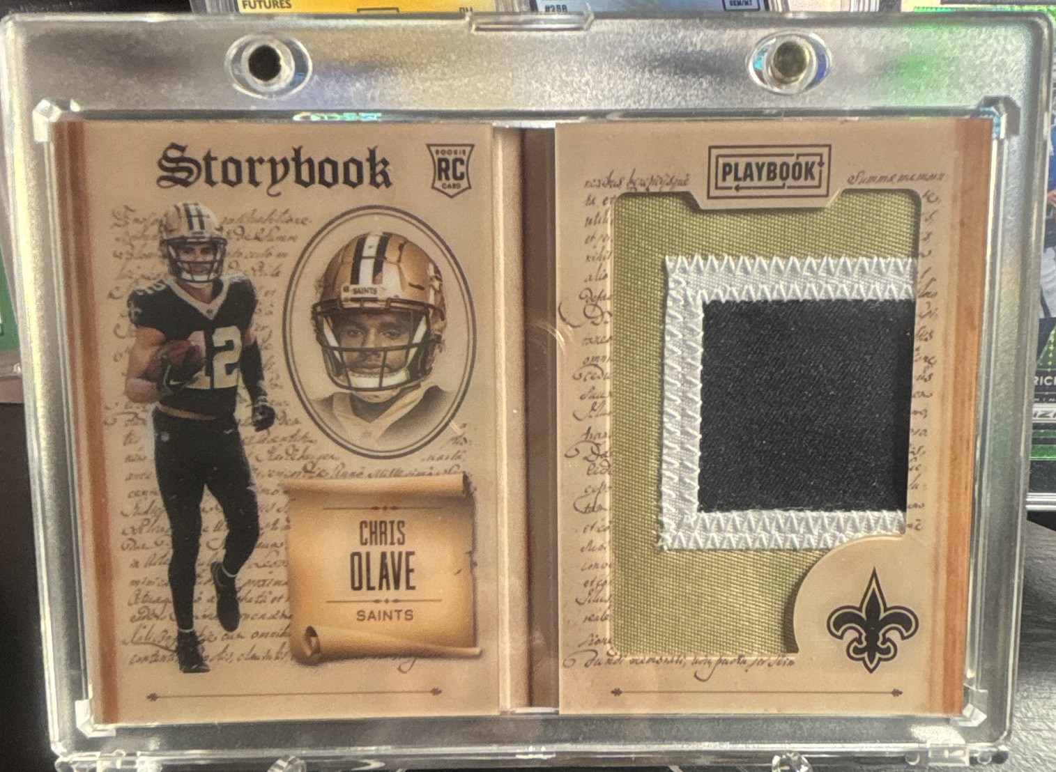Panini 2022 Playbook Chris Olave Saints Storybook SB-6 RC Booklet Patch /49