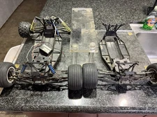 (2) Vintage Duratrax Evader ST 1/10 Stadium Truck Rollers/ Parts Truck !!