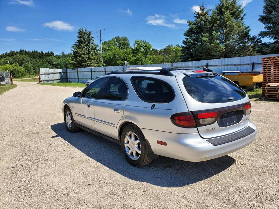 Conjunto de manija de puerta exterior trasera izquierda izquierda Mercury Sable 1999-2005 (plateado) Foto 2 de 4