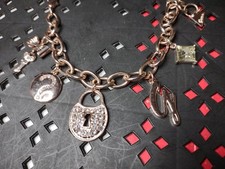 Collana Guess con lucchetto e chiave tono oro rosa 15 pollici