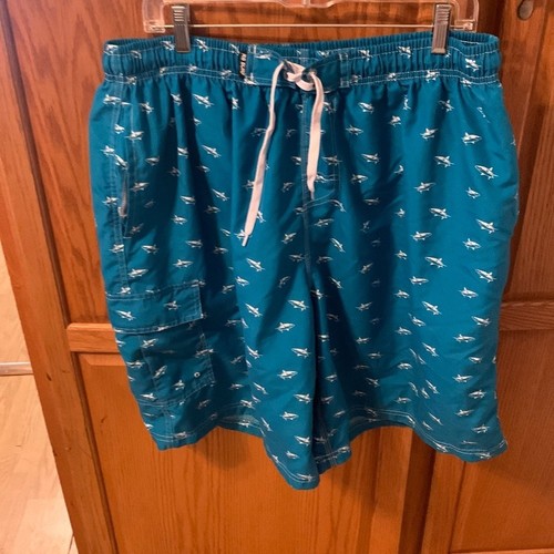 Gently used men's swim trunks size 3X. Shark pattern