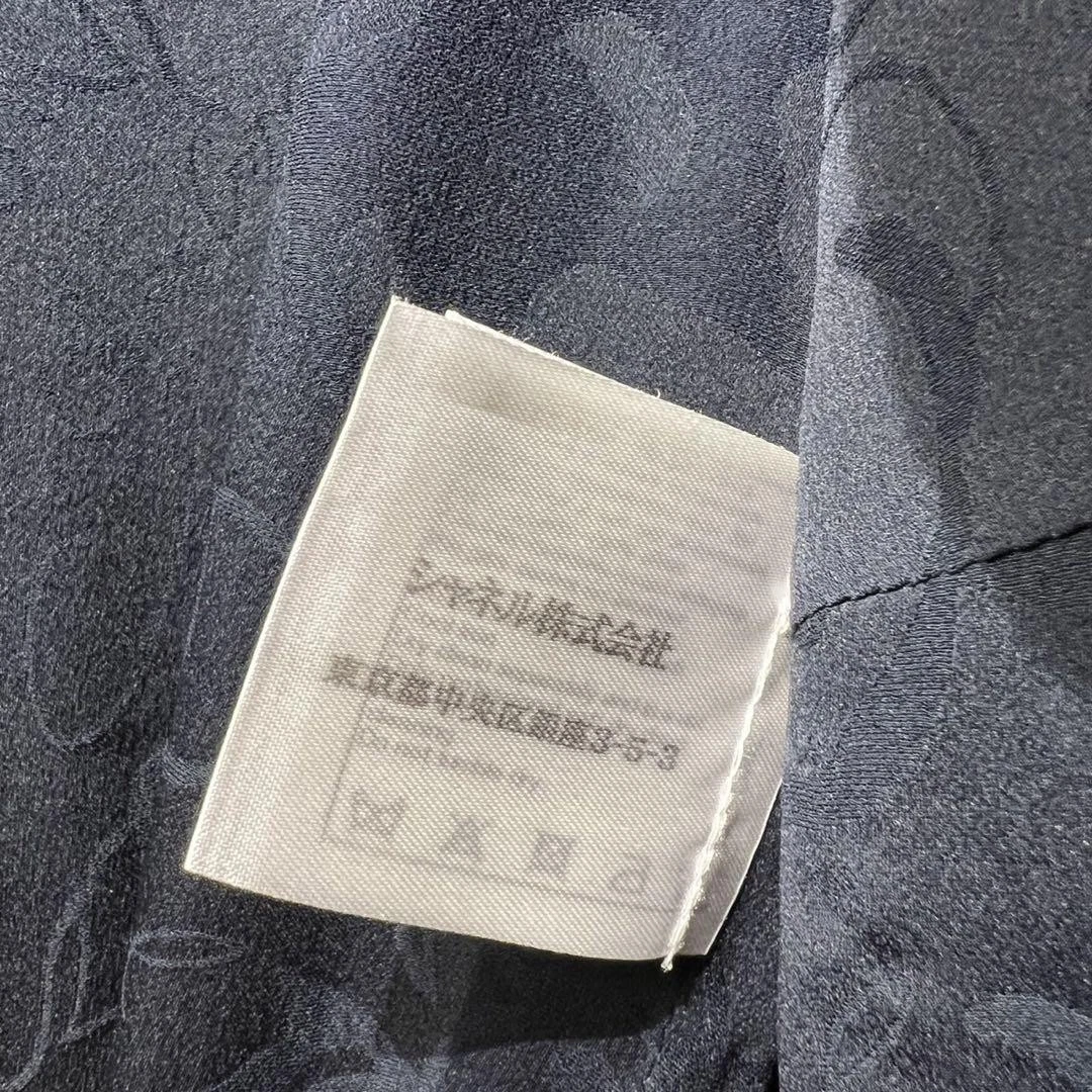 Rara giacca Chanel collo aperto marchio Coco catena monogramma