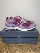 Size UK10- New Balance 2002R Protection Pack Pink Purple