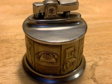 Vintage Idealine Table Lighter Telephone History 2 1/4" x 2 1/4"