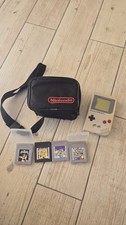 Nintendo Game Boy DMG-01 plus four games and original carry case.