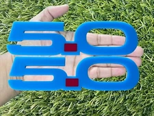 5.0 Emblem Badges Set of (2) Racing Aggressive Light Blue With Red Dot Badges