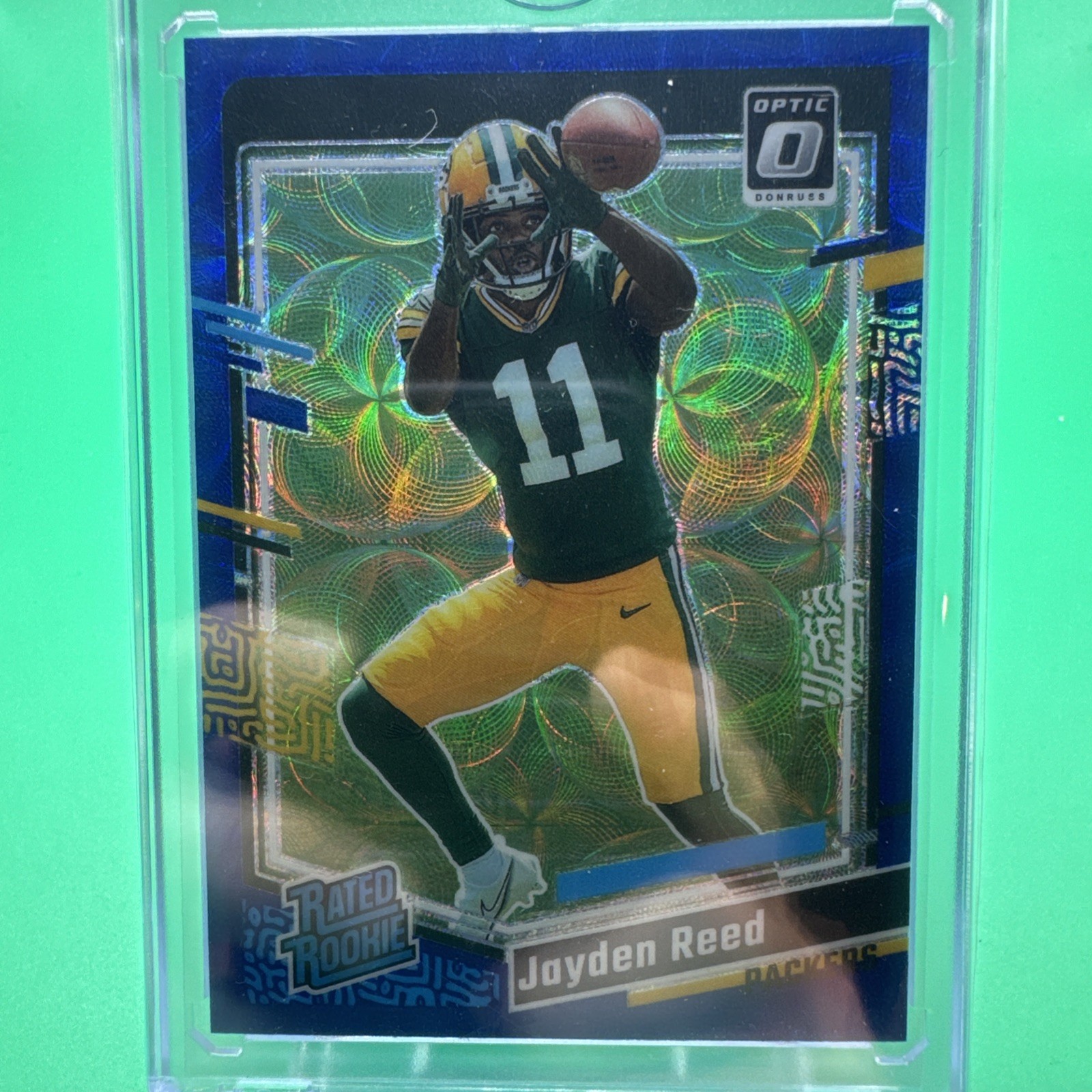 2023 Panini Donruss Optic - Rated Rookie Jayden Reed #239 Blue Scope Prizm (RC)