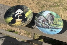 Vintage Bradford exchange, panda and elephant plates by Will Nelson