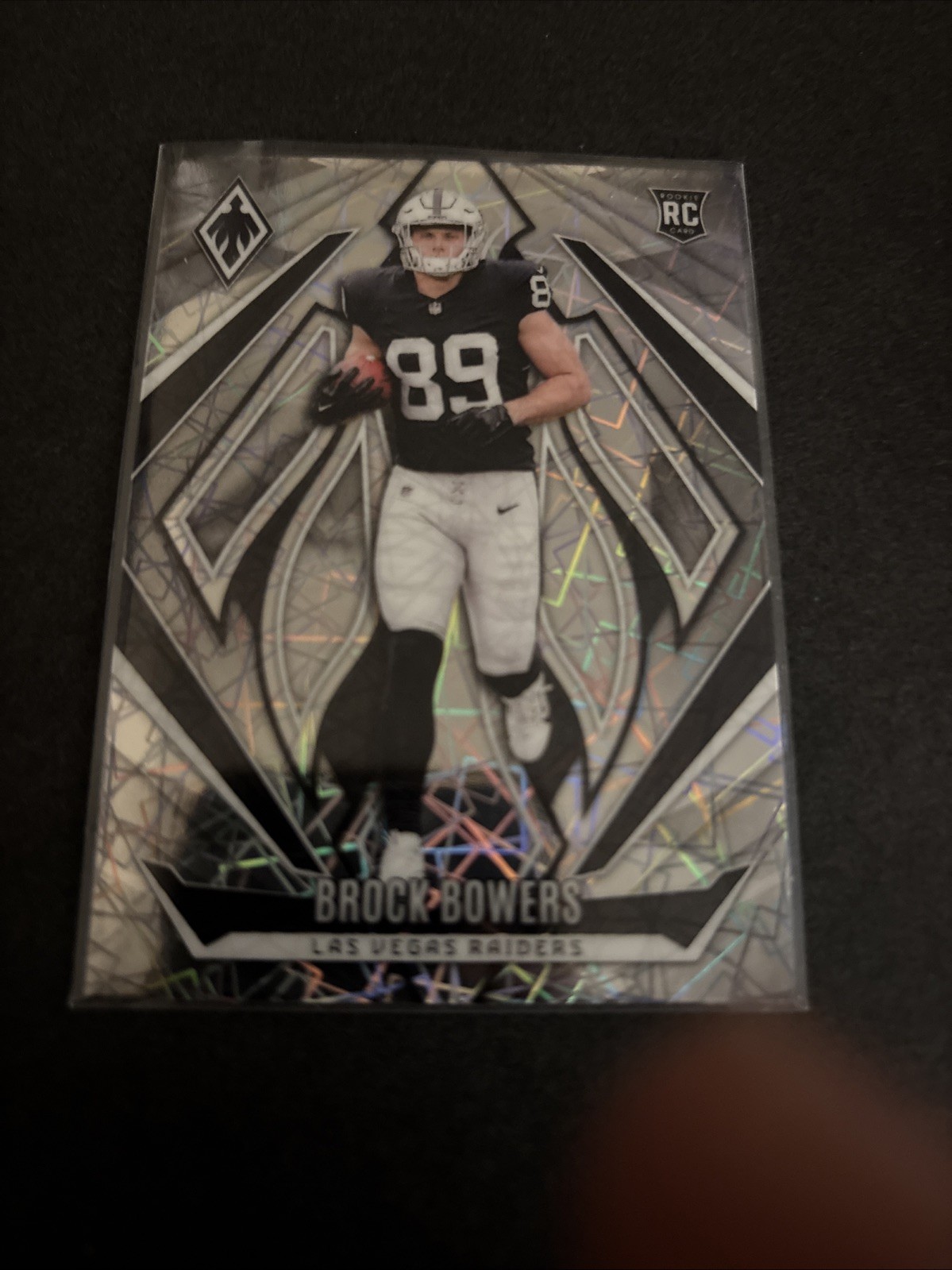 2024 Panini Phoenix - Rookies Brock Bowers #165 Lazer (RC)