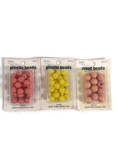 60pcs small beads 48 plastic and 12 wood new in packages 3 packages