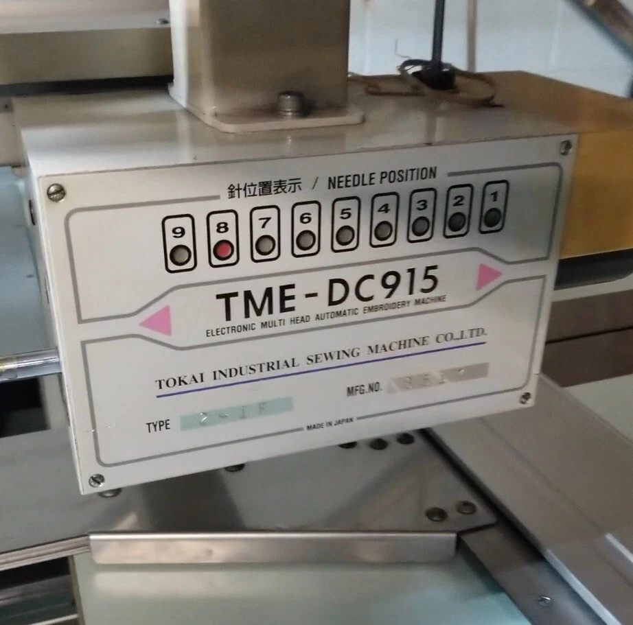 Máquina de bordar TAJIMA 15 cabezales marco tubular TME-DC 915 TME DC 915 usado Foto 3 de 3