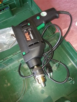 Skil bohrmaschine  450 WATT  + bosch koffer