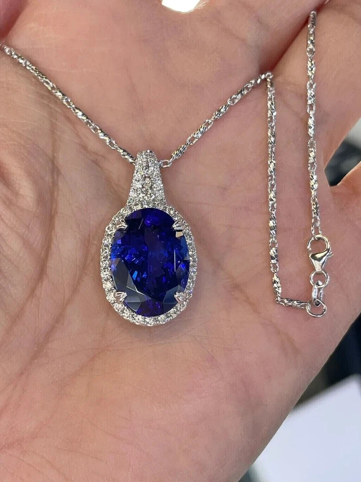 Colgante con halo de zafiro azul natural corte ovalado de 2,0 quilates chapado en oro blanco de 14 quilates cadena de 18" Foto 4 de 4