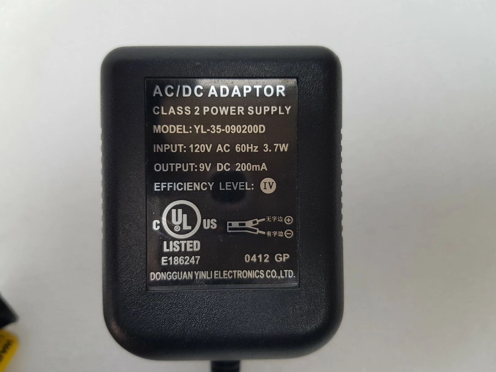 Label of the YL-35-090200D AC/DC adaptor: input 120V AC 60Hz 3.7W, output 9V DC 200mA, UL listed