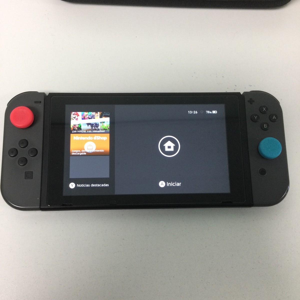 FAIR Nintendo Switch 32GB Console Bundle with Red and Blue FAIR Nintendo Switch 32GB Console Bundle with Red and Blue