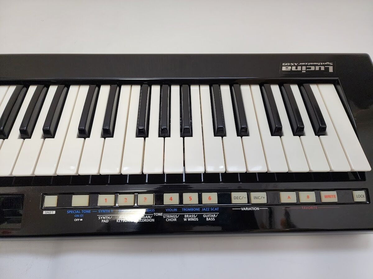 Roland AX-09 Black Lucina 37Key Keytar Synthesizer | eBay Roland AX-09 Black Lucina 37Key Keytar Synthesizer | eBay